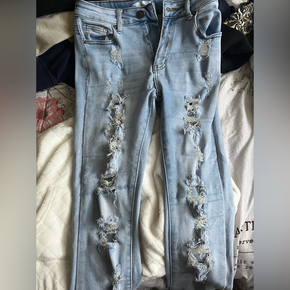 Blue ripped jeans